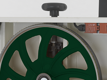 Heavy Duty Cast Iron Band Wheels  Dynamically balanced and heavy, the wheels provide a flywheel effect during use, contributing to the power and effectiveness of the machine.